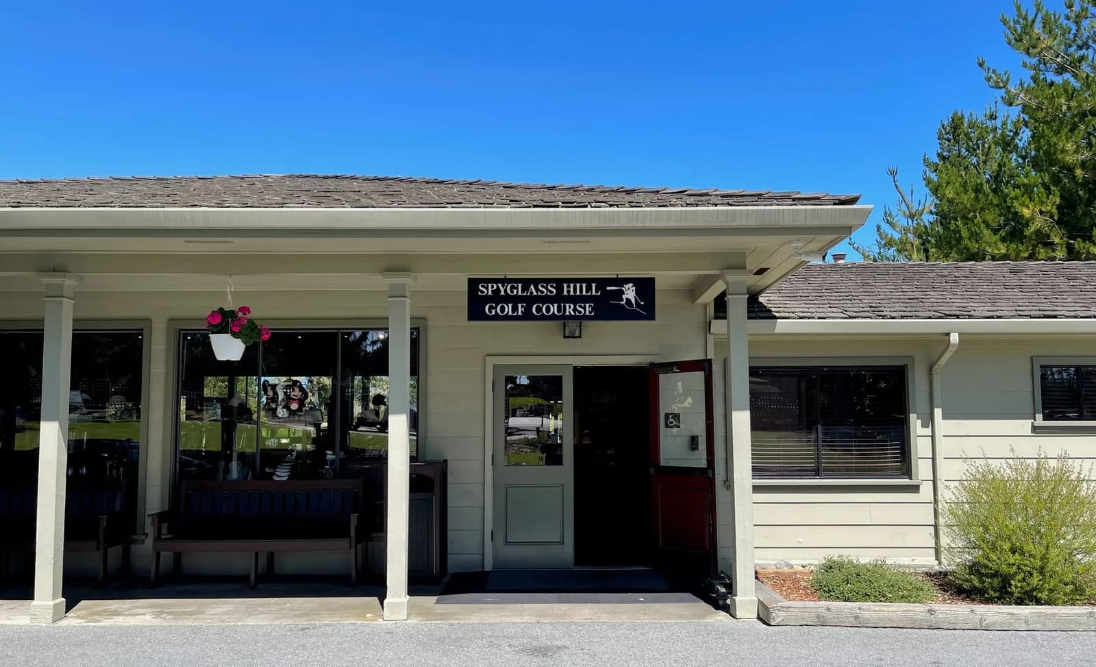 The clubhouse entrance and Spyglass Hill Golf Course sign at Pebble Beach