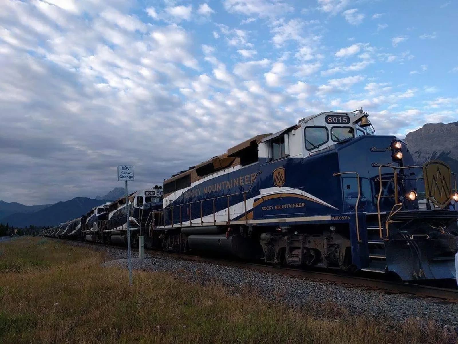 Rocky Mountaineer train travelling through the Canadian Rockies near Canmore